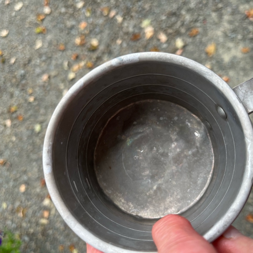 Aluminum measuring cup , capacity one cup , in good shape.
